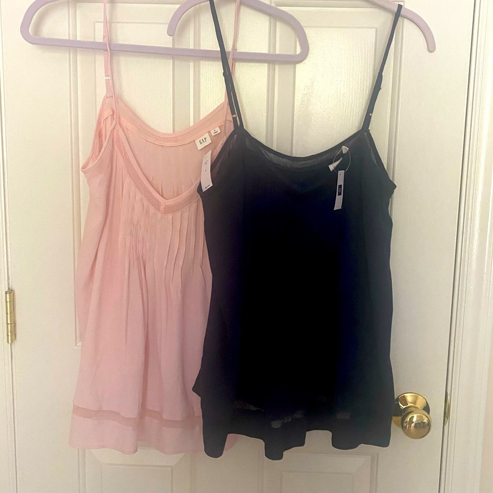 TWO! Never worn Cami’s
